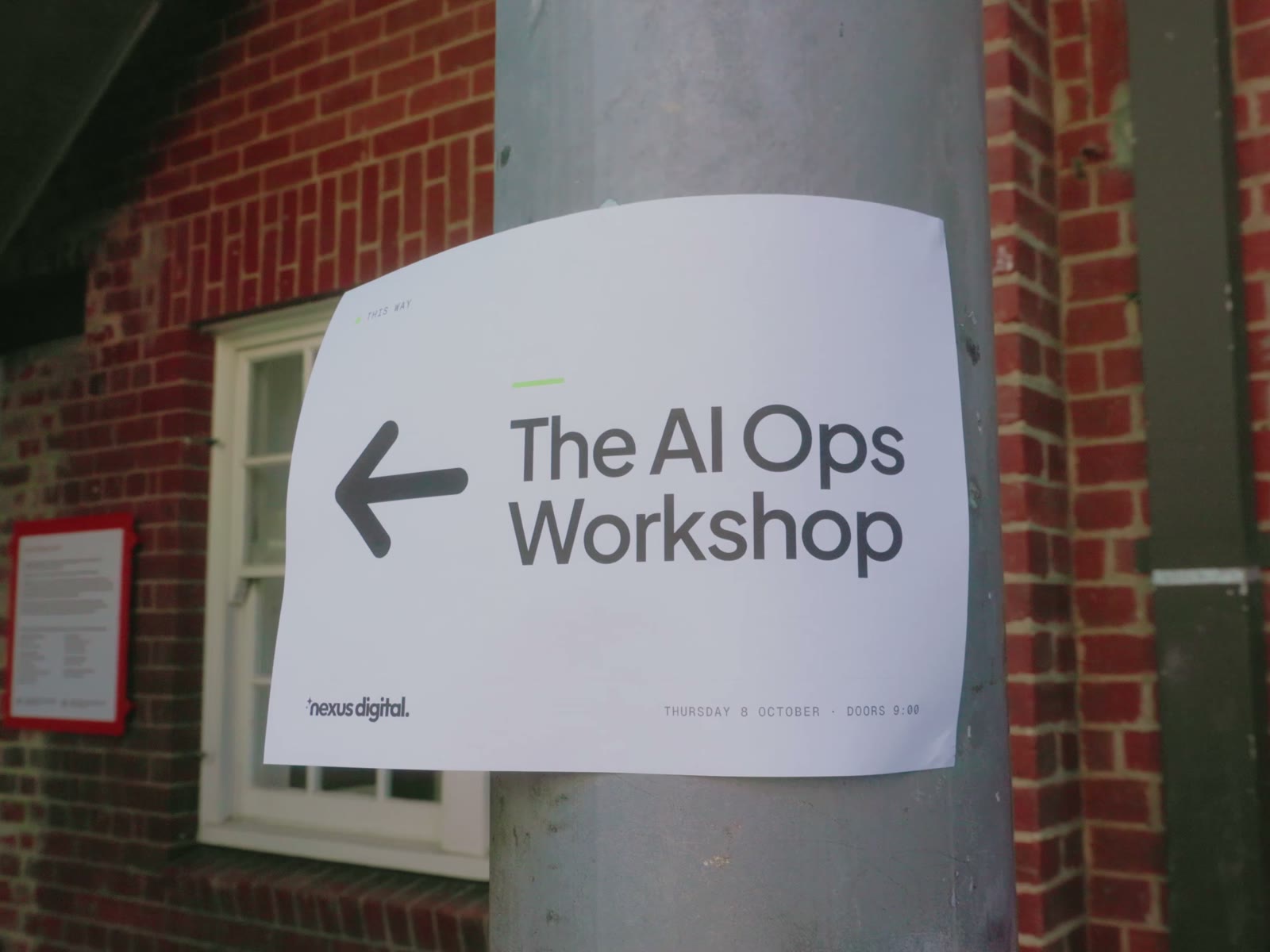 The AI Ops Workshop sign at the venue entrance, Collingwood Yards