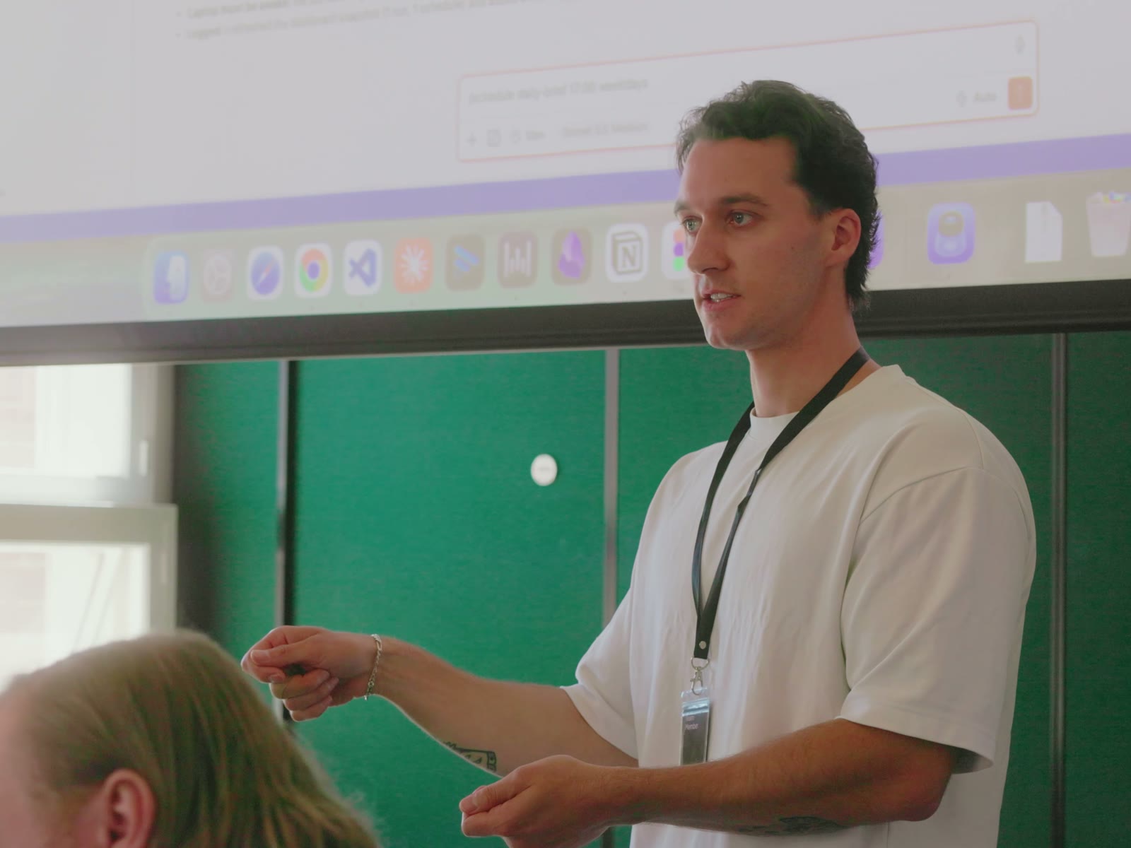 Ryan presenting at the screen in the first room
